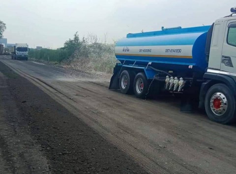 บริการฉีดพ่นน้ำไล่ฝุ่นพื้นถนน บริการฉีดพ่นน้ำไล่ฝุ่นพื้นถนน